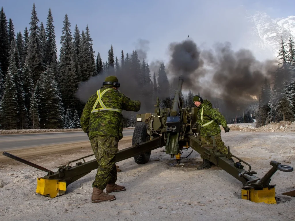 Canadian Armed Forces using artillery