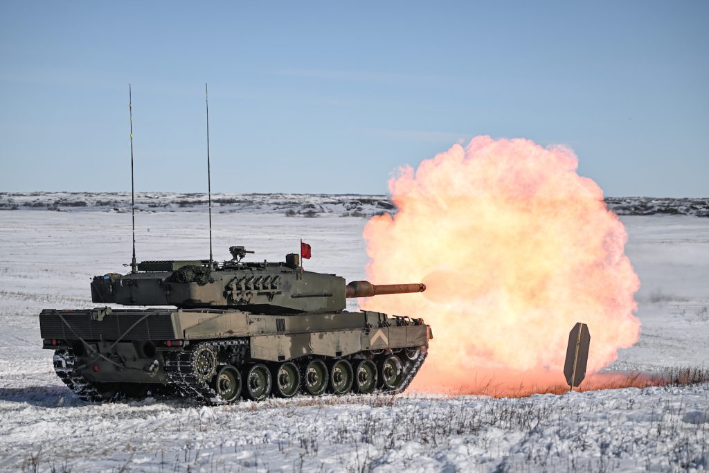 Canadian soldiers conduct a live-fire exercise in a Leopard battle tank